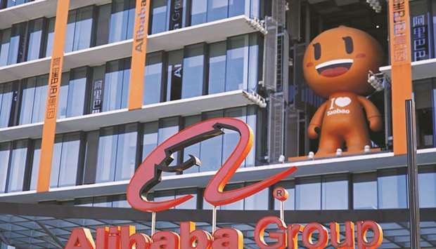 The Alibaba Group logo is seen at its headquarters in Hangzhou, Zhejiang province, China. Once hailed as the standard-bearers of Chinau2019s economic and technological ascendancy, Alibaba and its compatriots now face increasing pressure from regulators worried about the speed with which theyu2019re amassing clout in sensitive arenas such as media and education.