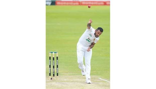 Sri Lankau2019s captain Dimuth Karunaratne delivers a ball during the third day of the first Test cricket match between South Africa and Sri Lanka at SuperSport Park in Centurion on  December 28.