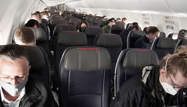 People fly on a media flight aboard a Boeing 737 Max airplane from Dallas Fort Worth Airport to Tulsa, Oklahoma in Dallas, Texas