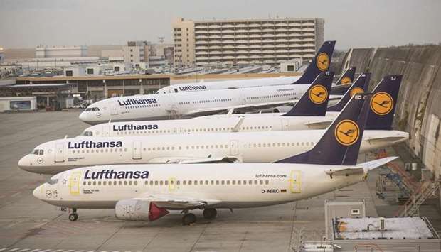 Lufthansa jets parked on the tarmac at Frankfurt Airport. A 20-member Lufthansa task force is at work devising how to fit more payload onto the airlineu2019s 15 Boeing Co 777 and MD-11 freighters, along with hold space in a vast passenger fleet, to transport vaccines meant to end the Covid-19 pandemic.