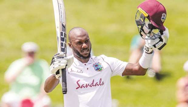 West Indies batsman Jermaine Blackwood celebrates reaching his century on the fourth day of the first Test match against New Zealand at Seddon Park in Hamilton.