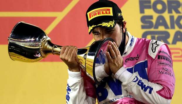 Racing Pointu2019s Mexican driver Sergio Perez celebrates after winning the Sakhir Formula One Grand Prix at the Bahrain International Circuit yesterday. (AFP)