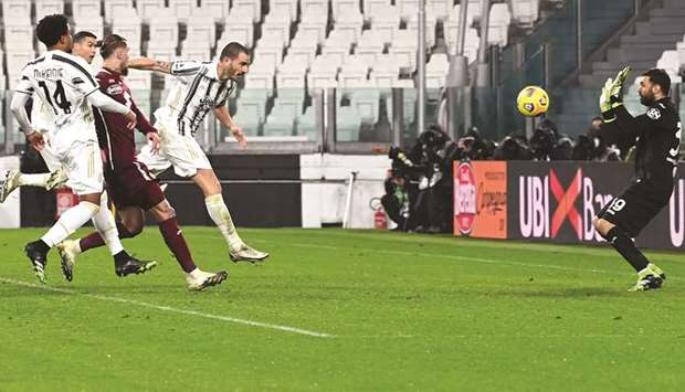 Juventusu2019 Leonardo Bonucci (centre) scores during the Italian Serie A match against Torino in Turin yesterday. (AFP)