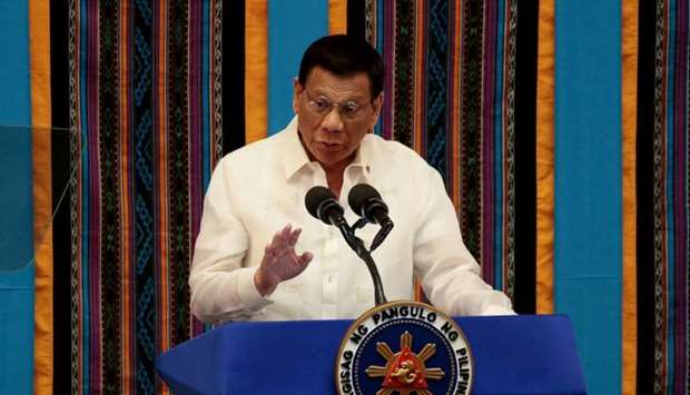 Philippine President Rodrigo Duterte gestures during his fourth State of the Nation address at the Philippine Congress in Quezon City, Metro Manila, Philippines, July 22, 2019