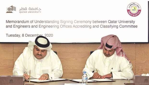 Dr Khalid Kamal Naji and engineer Khaled Juma al-Marzooqi sign the MoU