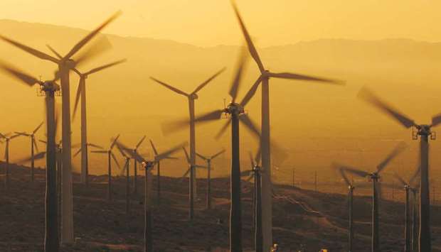 The sun rises on spinning turbines at the San Gorgonio Pass near Palm Springs, California where consistently strong winds power thousands of windmill-driven electric generators (file). Climate action also pays off. An index which tracks CDPu2019s A List saw an average annual return that was 5.3% higher than competitors over the past seven years. The Stoxx Global Climate Change Leaders, which measures the performance of companies on CDPu2019s A List Index relative to the Stoxx Global 1800, has climbed about 13% since the start of 2020.