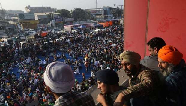 Farmers attend a protest during a nationwide strike against the newly passed farm bills at Singhu border near Delhi, India, December 8