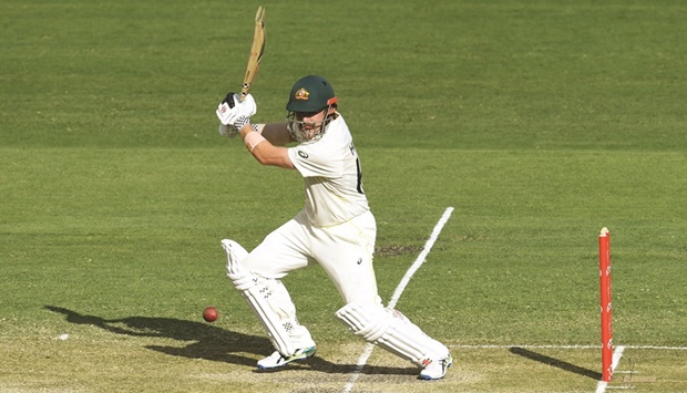Australiau2019s Travis Head in action on the second day of the first Ashes Test at the Gabba, Brisbane, Australia, yesterday. (Reuters)