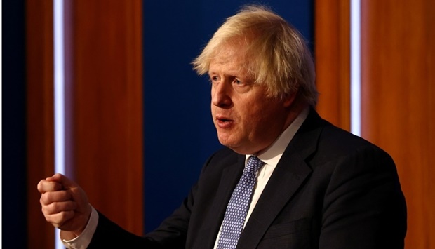 British Prime Minister Boris Johnson holds a news conference for the latest coronavirus disease update in the Downing Street briefing room, in London, Britain on December 8.