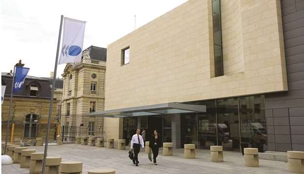 An external view of the Organisation for Economic Co-operation and Development headquarters in Paris. The OECD warned yesterday that the Omicron coronavirus variant threatens the global economic recovery as it lowered the growth outlook for 2021 and appealed for a swifter rollout of Covid vaccines.