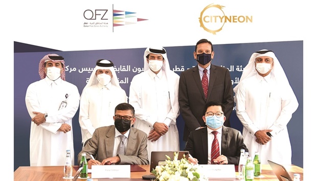 QFZA and Cityneon Holdings officials during the signing ceremony.