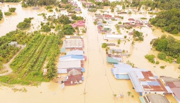 An aerial view shows a flooded residential area after torrential rains, in this screen grab taken from a drone footage in Hulu Langat district, Selangor state, Malaysia. SHAHRUL AZMIR via REUTERS