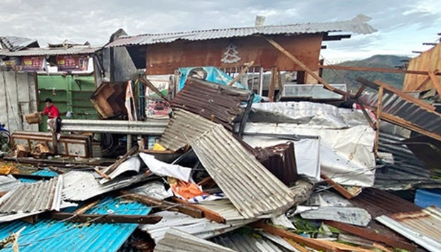 More than 300,000 people fled their homes and beachfront resorts as Typhoon Rai ravaged the southern and central regions of the archipelago. The storm knocked out communications and electricity in many areas, ripped off roofs, damaged hospitals, toppled concrete power poles and flooded villages. (AFP)