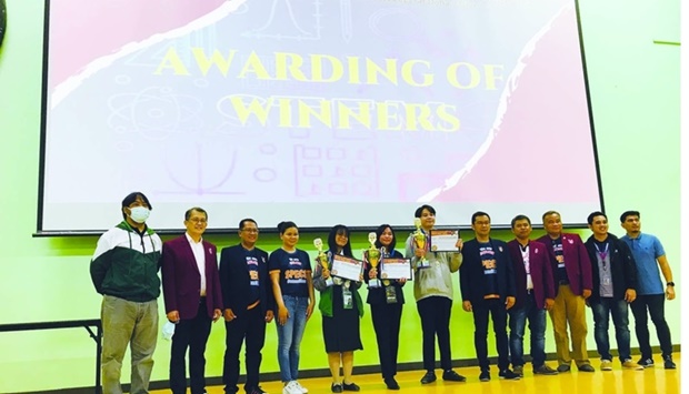 Dignitaries from the Philippine Institute of Civil Engineers Qatar Chapter with the winners