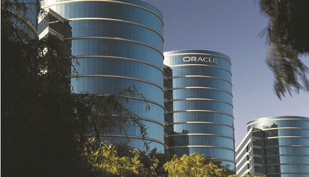 Oracle Corp headquarters in Redwood City, California. Oracle agreed to acquire medical-records systems provider Cerner Corp for about $28.3bn, a deal that would add a broad customer base in the healthcare industry to bolster the software makeru2019s cloud-computing and database businesses.