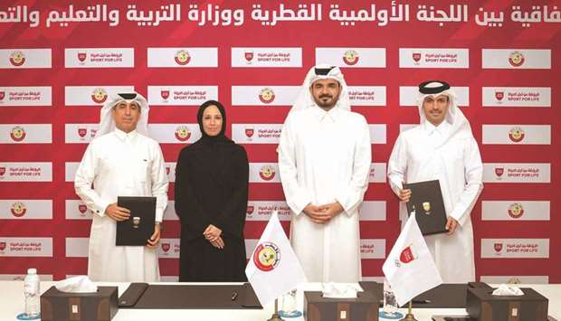 HE Sheikh Joaan bin Hamad al-Thani, HE Buthaina Ali Jabr al -Nuaimi , HE Jassim bin Rashid al -Buenain and HE Ibrahim bin Saleh al-Naimi at the agreement signing ceremony on Thursday