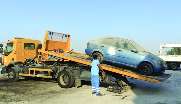 File picture of an abandoned vehicle being removed.