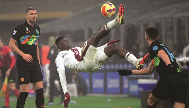 Torinou2019s Wilfried Singo in action against Inter Milan during their Serie A match at San Siro, Milan, Italy, yesterday. (Reuters)