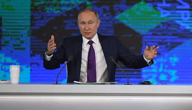 Russian President Vladimir Putin holds his annual press conference yesterday at the Manezh exhibition hall in central Moscow.