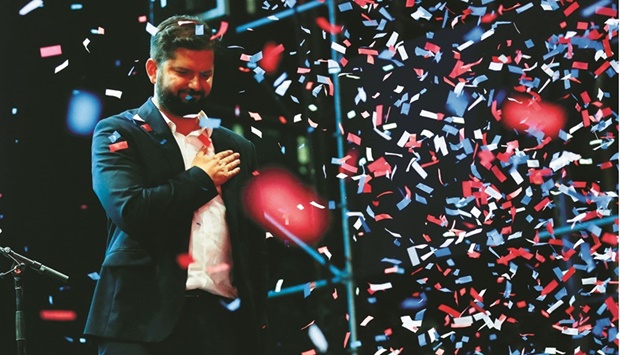 VICTORIOUS: Chileu2019s President-elect Gabriel Boric celebrates with supporters after winning the presidential election in Santiago last week. (Reuters)