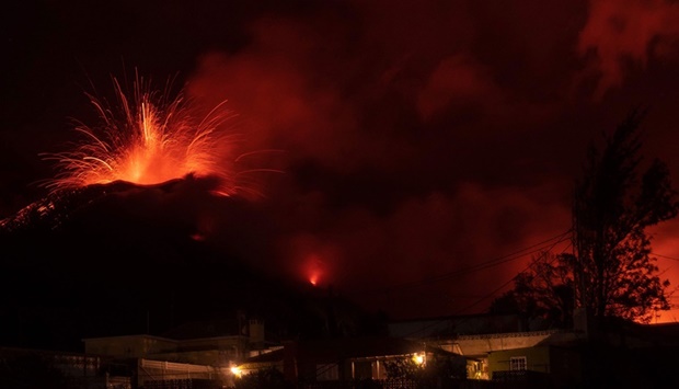 The Cumbre Vieja volcano, pictured from El Paso, spews lava on the Canary island of La Palma, Spain, on December 13. AFP
