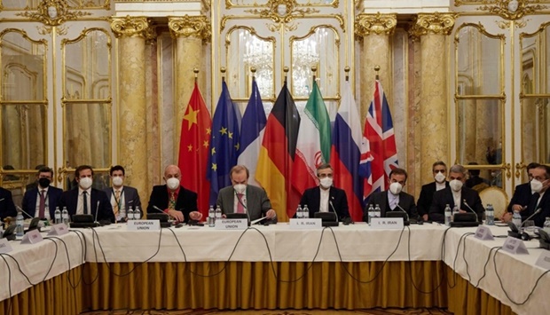 Representatives attending a meeting of the joint commission on negotiations aimed at reviving the Iran nuclear deal in Vienna, Austria