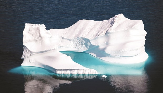In this file photo, an aerial photo shows an iceberg as it floats along the eastern cost of Greenland near Kulusuk. (AFP)