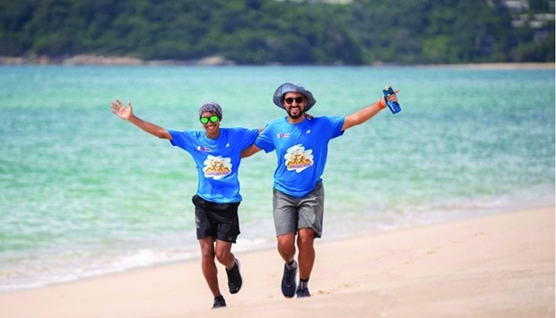 Qatari runner Mubarak Abdulaziz al-Khulaifi, along with Thai runner Purnsak Thongchi during the challenge.