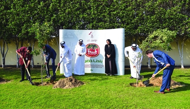 Officials from the Public Parks Department and the Gardens Department of the Municipality of Al Khor and Al Thakhira and the company participate in the event