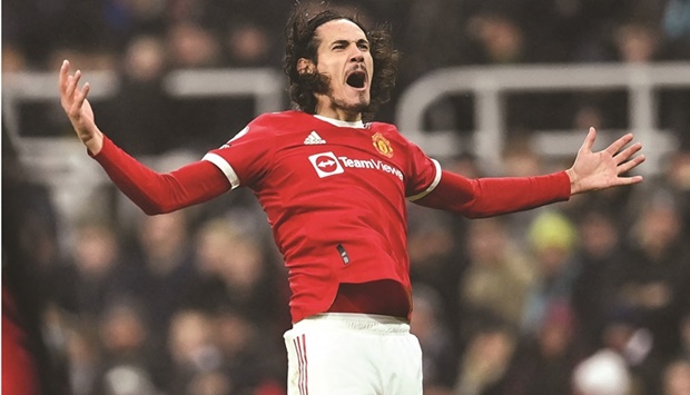 Manchester Unitedu2019s Edinson Cavani celebrates after scoring against Newcastle during the Premier League match on Monday. (AFP)