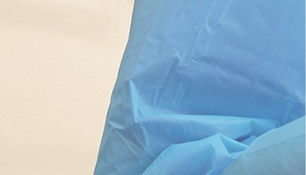 A medical worker is seen while administering tests at the Bondi Beach drive-through coronavirus disease (Covid-19) testing centre in the wake of an outbreak in Sydney, Australia.