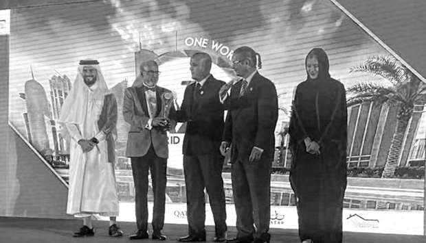 Doha Bank CEO Dr R Seetharaman receiving the 'Triumph Award' at the BIZZ AMEA awards ceremony.