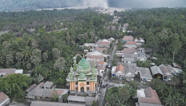 An aerial view of Sumber Wuluh village covered with volcanic ash following the eruption of Mount Semeru volcano in Lumajang regency, East Java province yesterday.