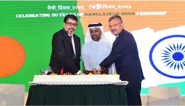 A cake was cut jointly by Yousef Sultan Larem and ambassadors Mohamed Jashim Uddin Dr Deepak Mittal to celebrate the occasion. PICTURES: Shaji Kayamkulam.