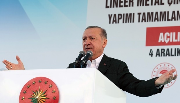 Turkish President Tayyip Erdogan speaks during a ceremony in the eastern city of Siirt, Turkey, December 4
