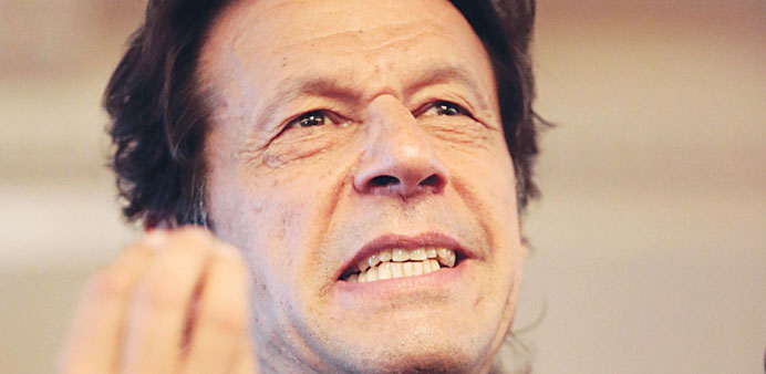 Imran Khan, chairman of Pakistan Tehreek-e-Insaf (PTI) political party, speaks during a news conference in Islamabad on August 5, 2014.