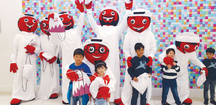 Ooredoou2019s Alrabaa seen with children during Qatar National Day celebrations.