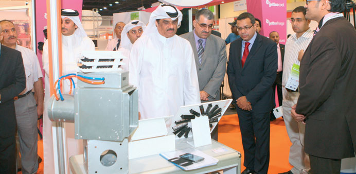 Mohamed al-Sayed accompanied by Waleed Wahba and other dignitaries, tour the expo yesterday.