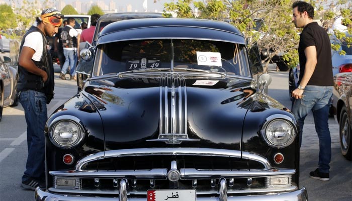A vintage automobile draws interest from visitors of Mowater Qatar 2015. PICTURE: Jayaram.