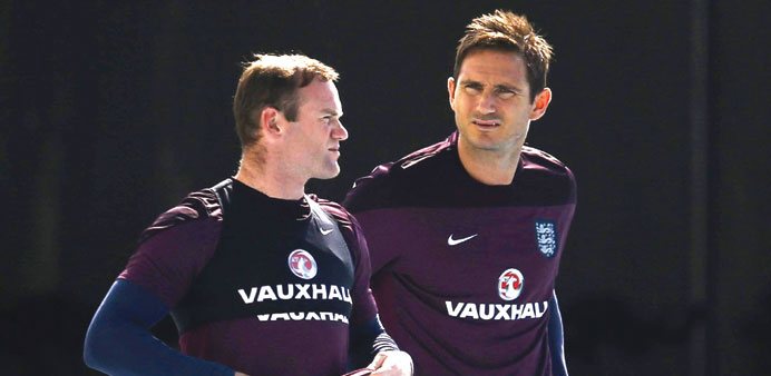 Englandu2019s Wayne Rooney (left) and Frank Lampard arrive for a training session in Rio de Janeiro yesterday. (Reuters)