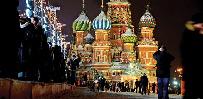 ALL LIT UP: St. Basilu2019s Cathedral, known for its colourful turrets and domes, dominates Red Square and dates to the 16th century. 