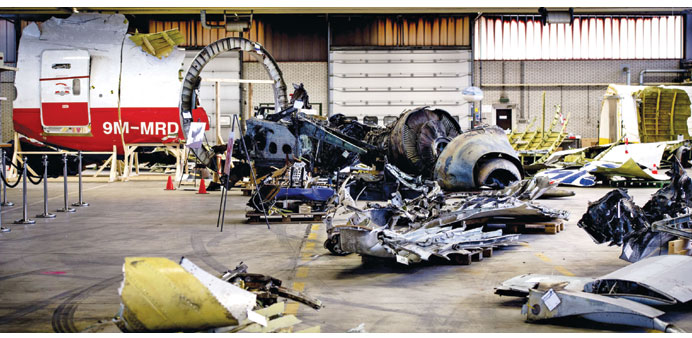 Debris from Malaysia Airlines flight MH17 laid out in a hangar on Gilze-Rijen airbase.