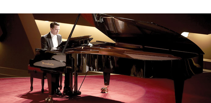 LEARNING CURVE: Elijah Wood in Grand Piano.