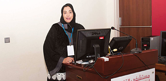 Dr. Huda al-Naemi speaks during the conference.