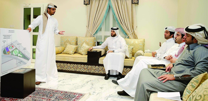  tOfficials discuss details of the stadium coming up at Al Thumama.