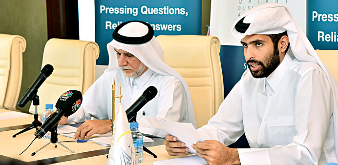 QBA board member Sheikh Mohamed bin Faisal al-Thani (right) announces the launching of the survey.