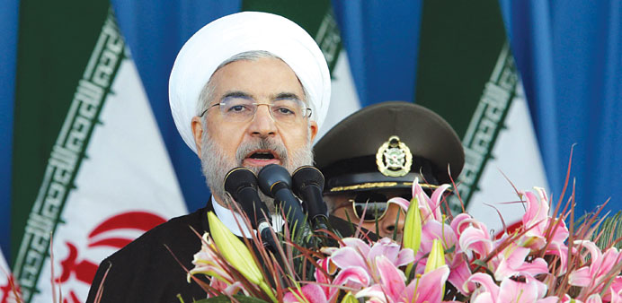 Rohani speaks during the parade.