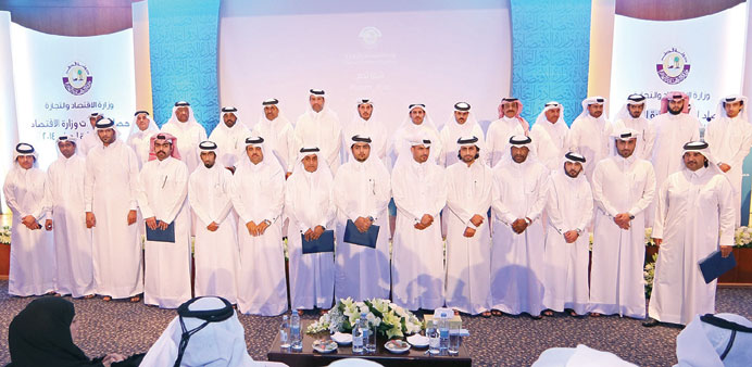 HE Sheikh Abdullah and HE Sheikh Ahmed with MEC employees honoured on the occasion.