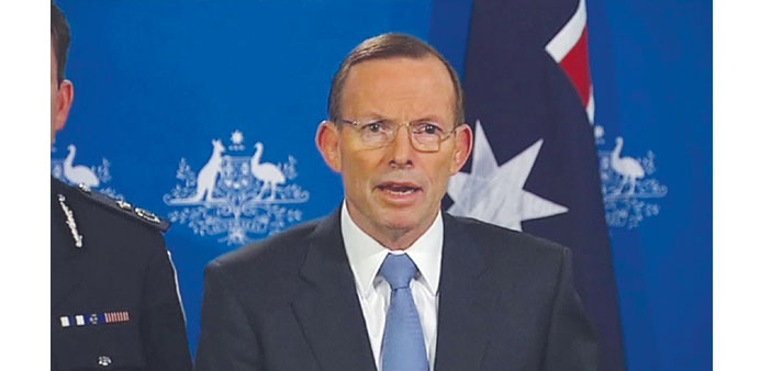 Australian Prime Minister Tony Abbott addresses a news conference in Melbourne yesterday in this still image taken from a handout video.