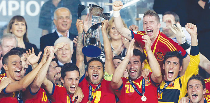 Spain captain Thiago Alcantara lifts the trophy after winning the UEFA Under 21 European Championship final against Italy in Jerusalem on Tuesday. Spa